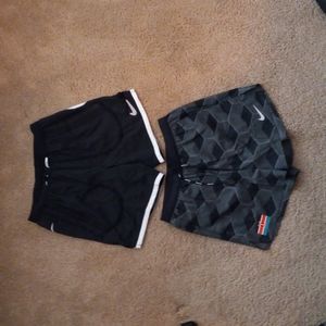 2 nikes running shorts size S